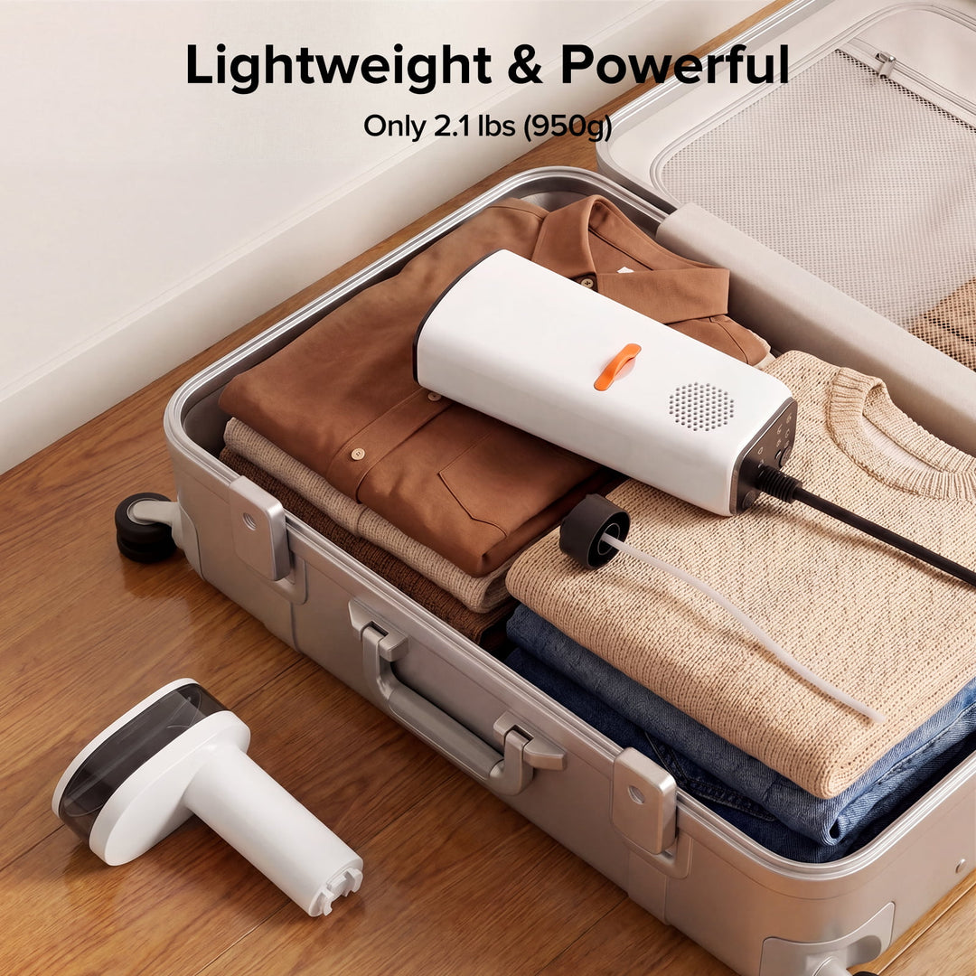Vacuum cleaner being used to compress clothes in a suitcase with text 'Lightweight & Powerful' and weight 'Only 2.1 lbs (950g)'.
